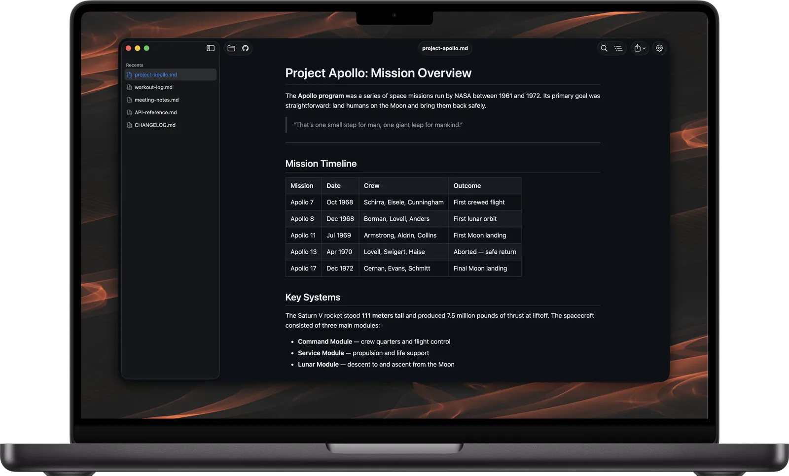 Read.md for Mac on a MacBook Pro — a native markdown reader with rendered tables and dark theme